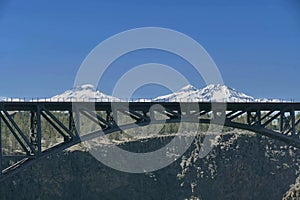 Steel bridge with Three Sisters in background