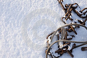 Steel wire rope and chain in snow