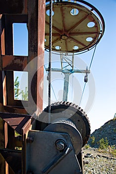 Steel cable and winch. Part of an old winch with a steel rope on a lift. Detail of the cableway. Close-up view of steel