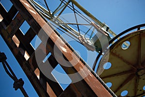 Steel cable and winch. Part of an old winch with a steel rope on a lift. Detail of the cableway. Close-up view of steel