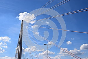 steel cables of the RaiffeisenbrÃ¼cke with the street lamps