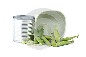 Steel can and fresh garden peas isolated on white