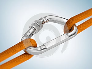 Steel carabiner hook with a climbing rope. Reliability, support concept