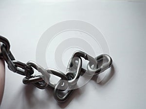 Steel chain in the hands of a man