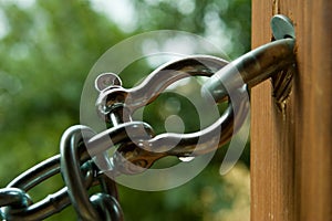 Steel chain and wooden beam