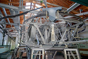 Steel construction of a cable car with riveted steel girders, steel cable and gondola