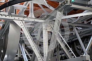 Steel construction of a cable car with riveted steel girders, steel cable and gondola