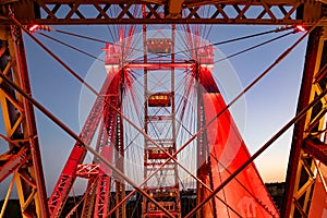 steel construction of red historic ferris wheel Wienner Riesenrad in Prater theme park Vienna, Austria