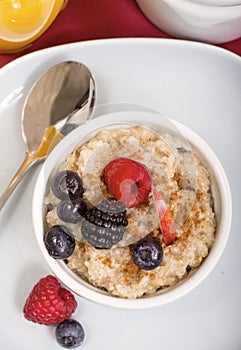 Steel cut oatmeal served with fresh fruit