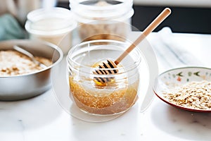 steel-cut oats in a clear glass bowl with honey drizzle