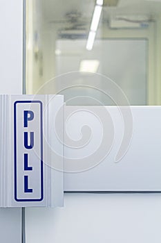 The steel door handle Inside white sterile cleanroom