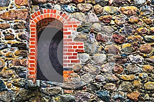 Steel door in stone wall