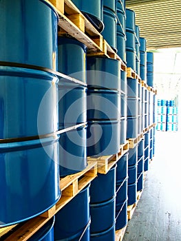 Steel drums stored in warehouse