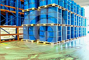 Steel drums stored in warehouse