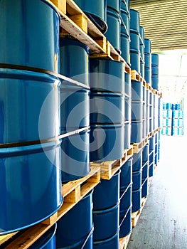 Steel drums stored in warehouse photo