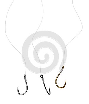 Steel fishing hooks with fishing line isolated on white