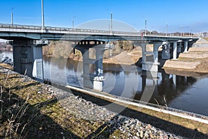 steel frame and concrete construction huge car bridge across the wide river