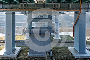 steel frame and concrete construction huge car bridge across the wide river