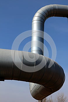 Steel gas pipe line under blue sky