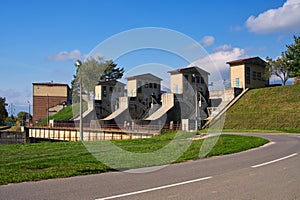 Steel gate of Krpelany water dam on Vah river with service buildings photo