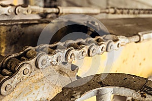 Steel gear wheel with chain drive of a boom mobile platform truck. Chain transmission.