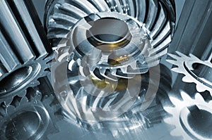 Steel gears mirrored in titanium photo