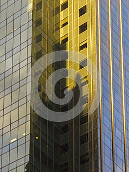 Steel and glass skyscraper forming abstract geometric shapes in New York