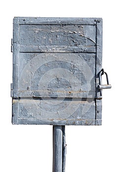 The steel gray old electric box is locked.