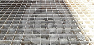 Steel grid squares for the prevention of falls