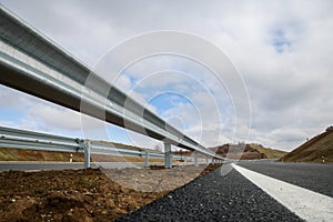 Steel guard rail barrier on the motorway