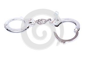 Steel handcuffs isolated on white background