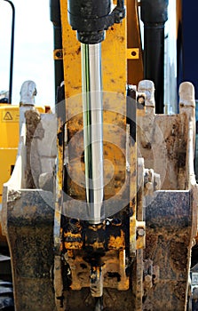 steel hydraulic piston to crane, which lifts and lowers the concrete slab during repair work.