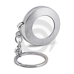 Steel key chain isolated on white background. Blank keyring in measuring tape concept.  Clipping path