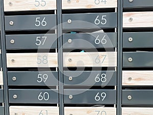 Steel mail boxes in an apartment residential building. Residential or office building