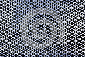 Steel mesh. Grid of car air filter. Metal grill texture of vehicle air filter.