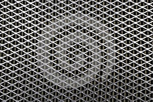 Steel mesh. Grid of car air filter. Metal grill texture of vehicle air filter.