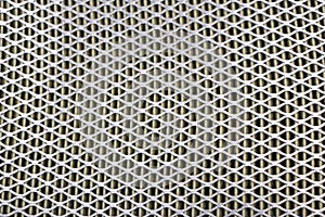 Steel mesh. Grid of car air filter. Metal grill texture of vehicle air filter.