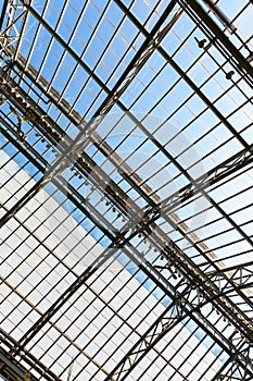 Steel metal design with a glass roof.