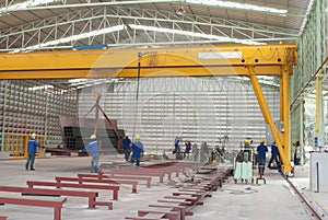 Steel moving with gantry crane photo