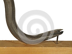 Steel nail puller to pull out a nail isolated on white background. photo