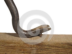 Steel nail puller to pull out a nail isolated on white background.