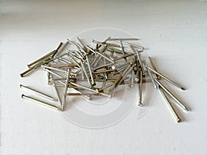 Steel nails on white background