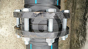 Steel nut secures the conduit made from rigid plastic pipes.