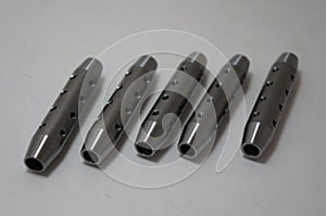 Steel parts close-up background. CNC turning engineering parts