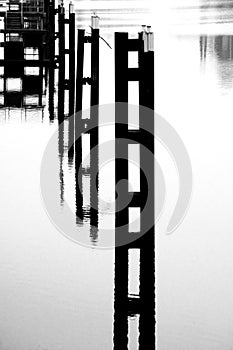 Steel piers in the water photo