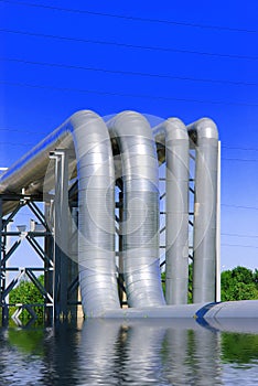 Steel pipe-line is photographed on sky background