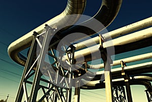 Steel pipe-line is photographed on sky background