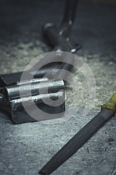 Steel pipe products and metal file on a working table