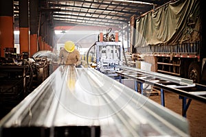 Steel plant workers at work.