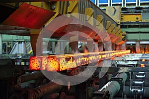 Steel production in electric furnaces. Sparks of molten steel. Electric arc furnace shop .
